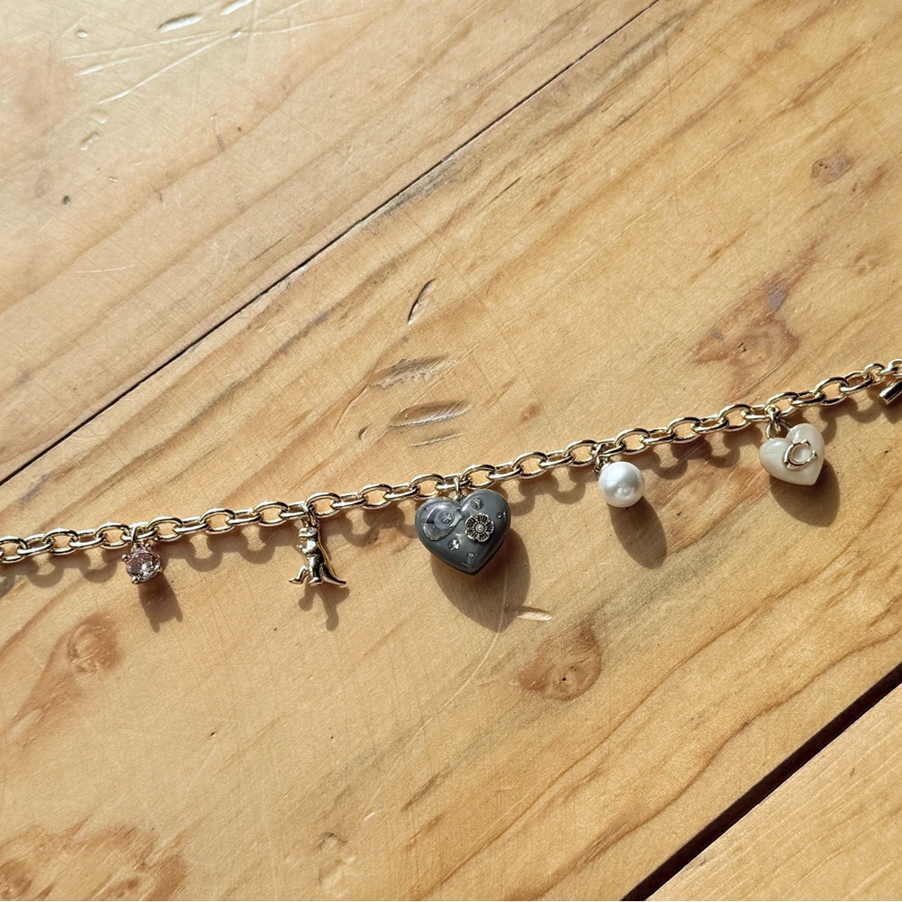 Coach Gold Charm Bracelet with Heart and Pearl Accents - Picture 2 of 5